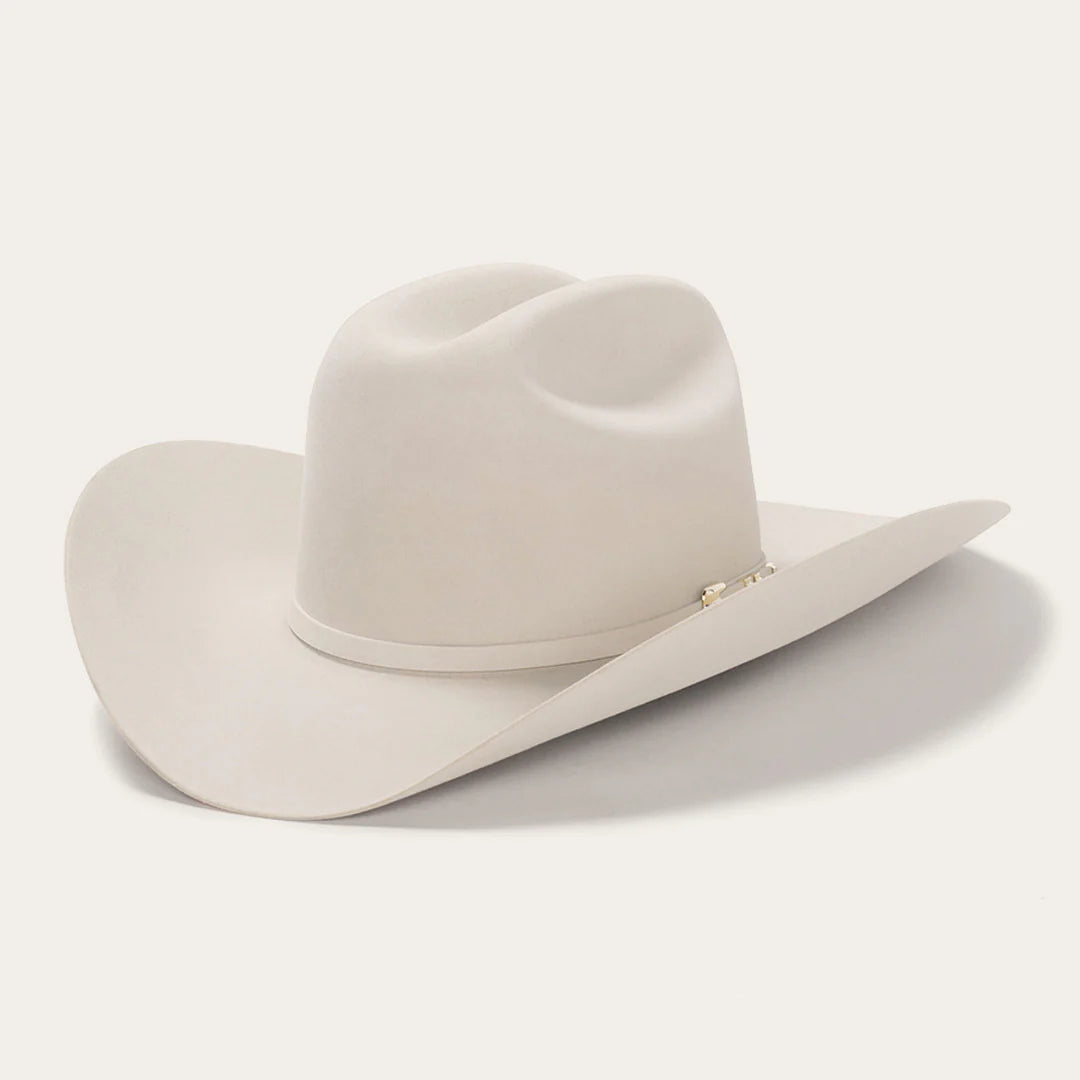 White cowboy hat on a light gray background