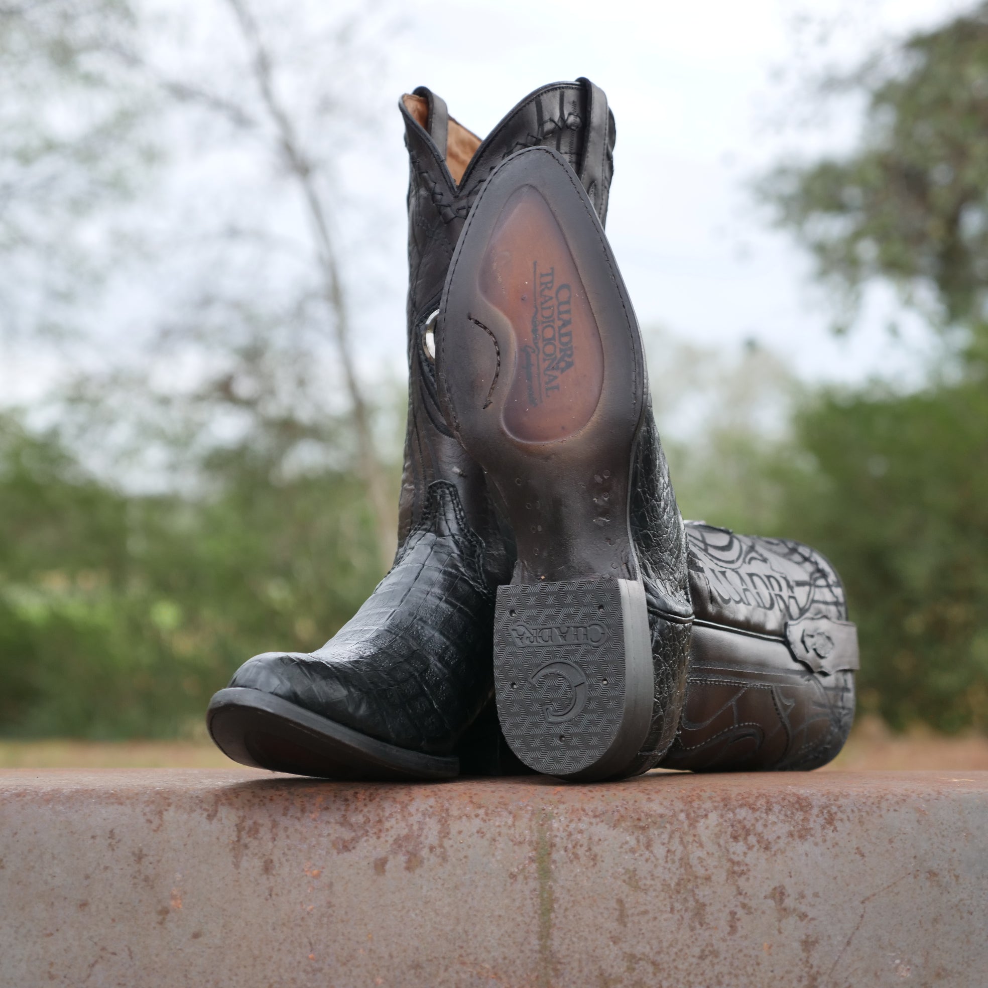 black caiman boots